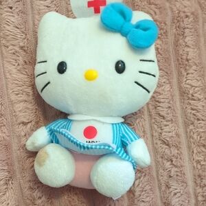 3/10$ or 5/25$ Hello Kitty Nurse Plush with Blue Bow and Striped Outfit